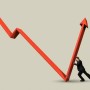 Man pushing line graph, close-up